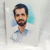 قاب عکس شهید احمدی روشن