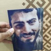 قاب با عکس شهید صدرزاده