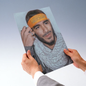 پوستر باکیفیت شهید محمد هادی ذوالفقاری با سربند یاعلی ابن موسی الرضا(ع)