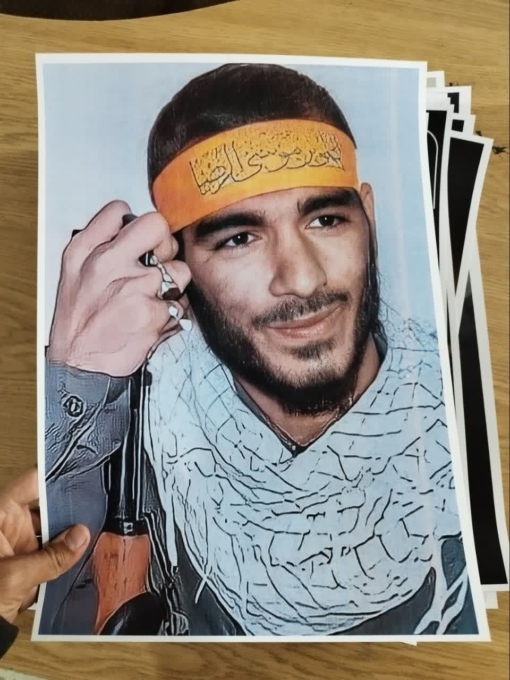 خرید پوستر باکیفیت شهید محمد هادی ذوالفقاری با سربند یاعلی ابن موسی الرضا(ع)